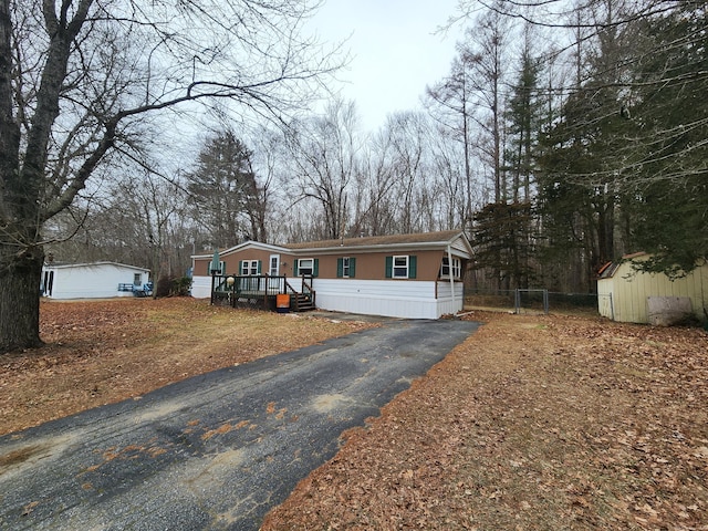 manufactured / mobile home featuring a storage unit