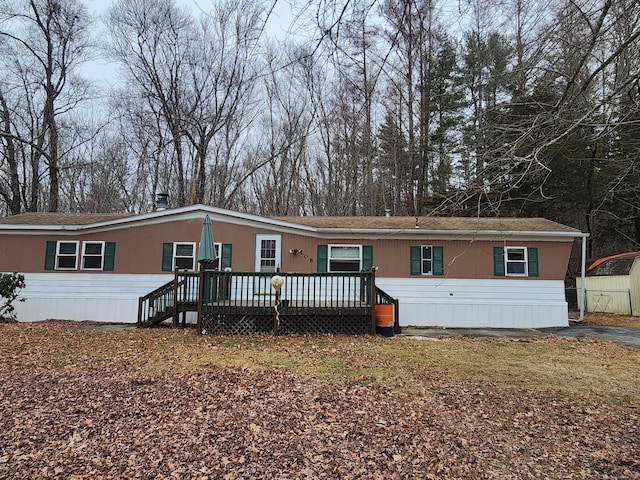 manufactured / mobile home featuring a deck