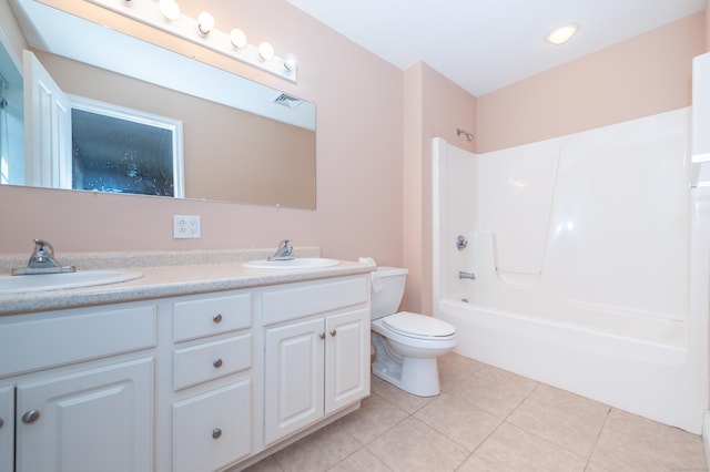 full bathroom featuring tile patterned flooring, vanity, toilet, and tub / shower combination