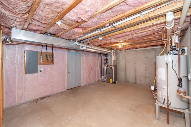 basement with electric panel, heating unit, and gas water heater