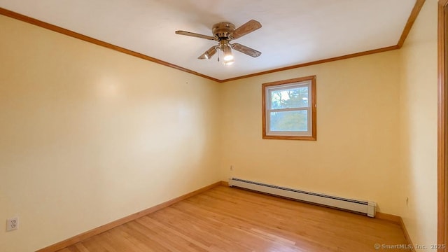 empty room featuring a baseboard heating unit, ceiling fan, ornamental molding, and light hardwood / wood-style flooring