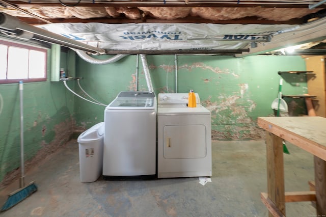 laundry room featuring laundry area and washer and clothes dryer