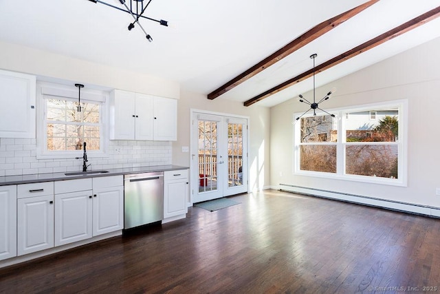 kitchen with dishwasher, sink, hanging light fixtures, and a baseboard radiator