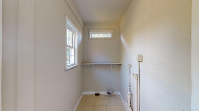 laundry room with light tile patterned floors