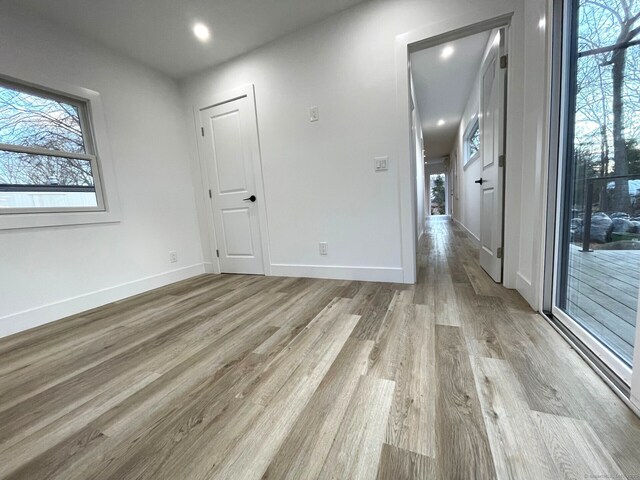 unfurnished room featuring light hardwood / wood-style flooring