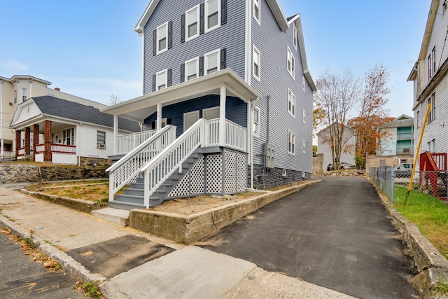 view of front of home featuring covered porch