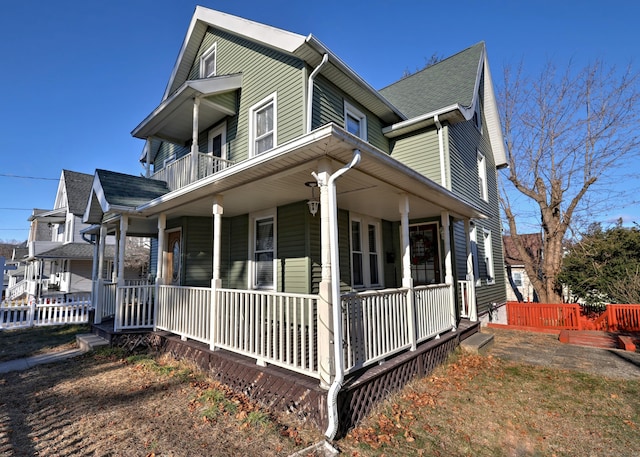 view of property exterior featuring a porch