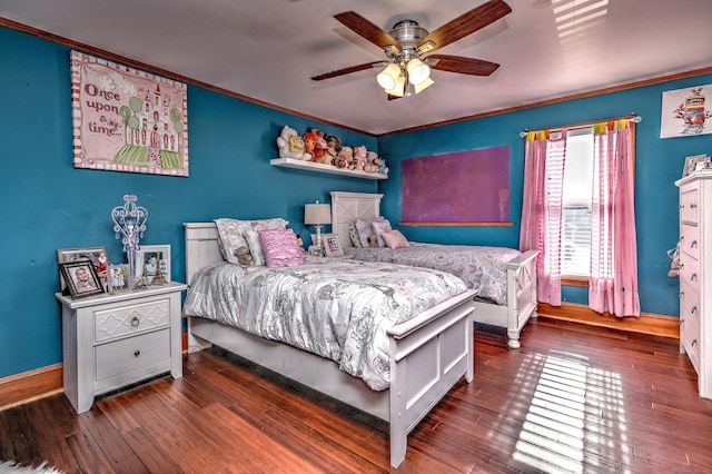 bedroom featuring ceiling fan, ornamental molding, and dark wood-type flooring