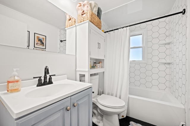 full bathroom with vanity, toilet, and shower / bath combo with shower curtain