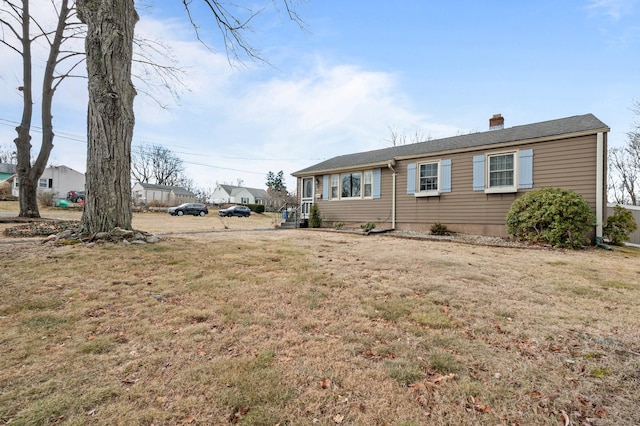 exterior space featuring a lawn