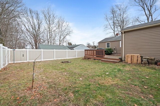 view of yard featuring a wooden deck