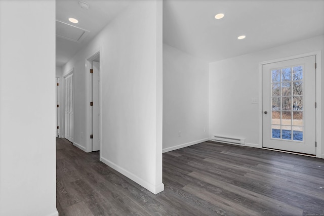 interior space featuring dark hardwood / wood-style flooring and a baseboard radiator