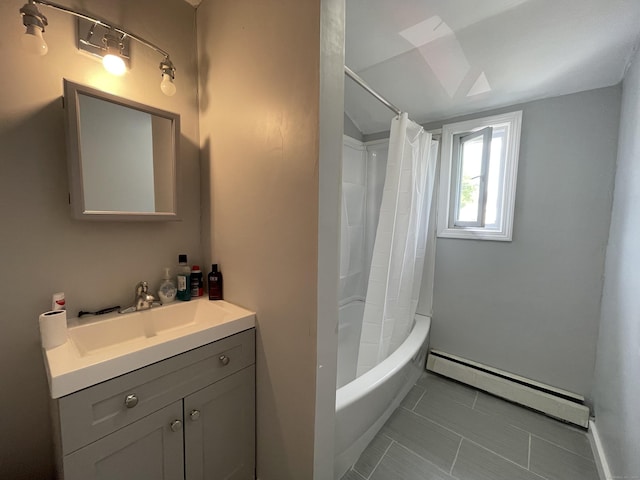 bathroom with shower / bath combination with curtain, vanity, a baseboard radiator, and tile patterned flooring