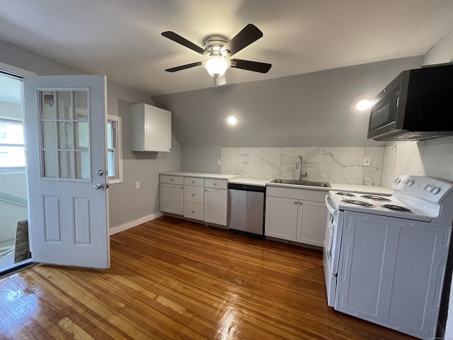 kitchen with white cabinetry, dishwasher, sink, tasteful backsplash, and white range oven