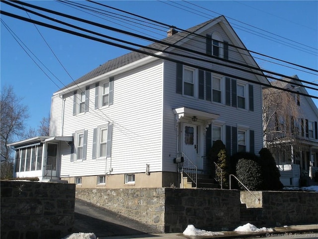 272 Boswell Ave, Norwich, CT 06360 - view of front of home featuring a chimney, roof with shingles, and entry steps