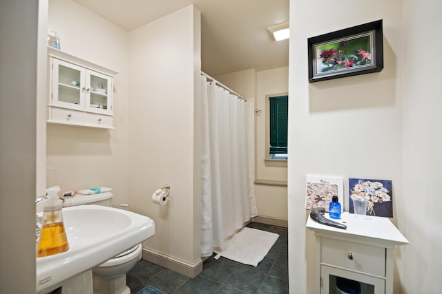 bathroom with tile patterned flooring and sink