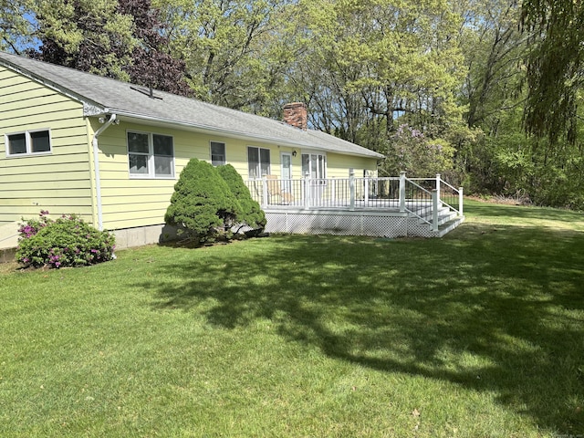 145 Massapeag Side Rd, Montville, CT 06382 - back of house with a chimney, a deck, and a lawn
