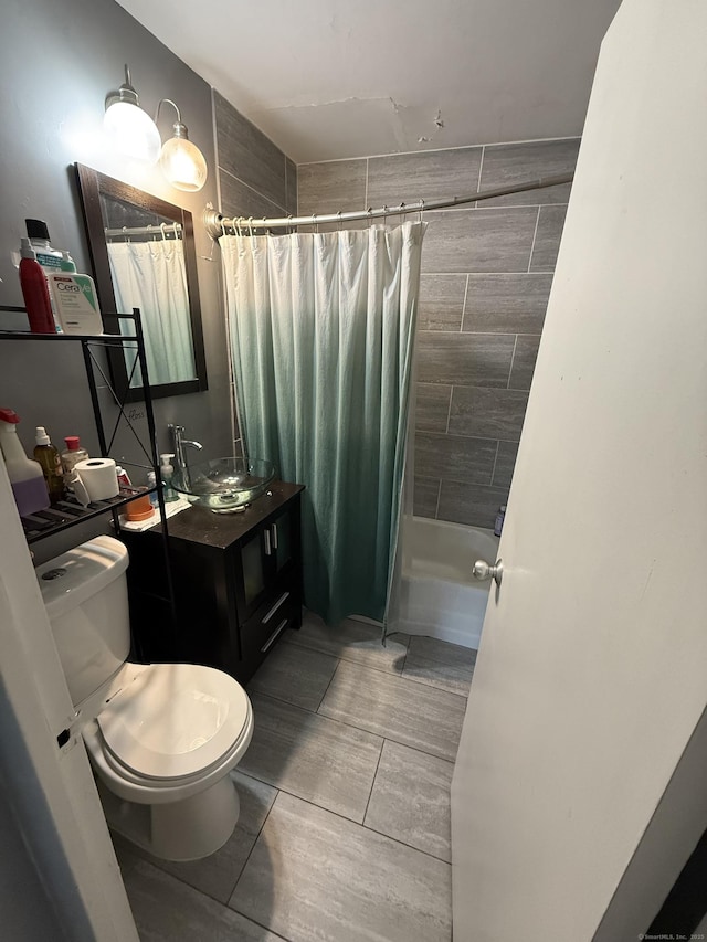 full bathroom with vanity, toilet, and shower / bath combo