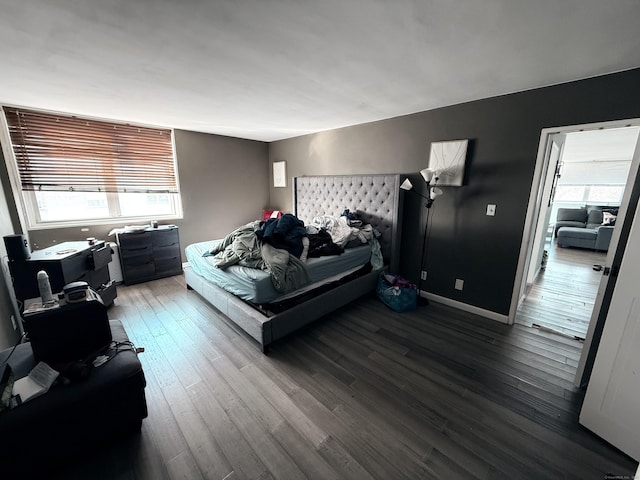 bedroom with wood-type flooring