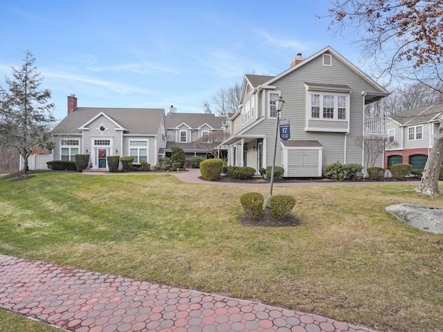 view of front of house featuring a front lawn