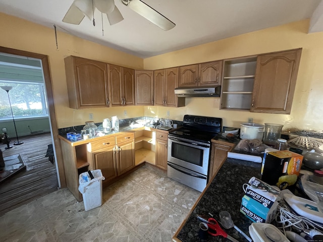 kitchen featuring ceiling fan and electric stove