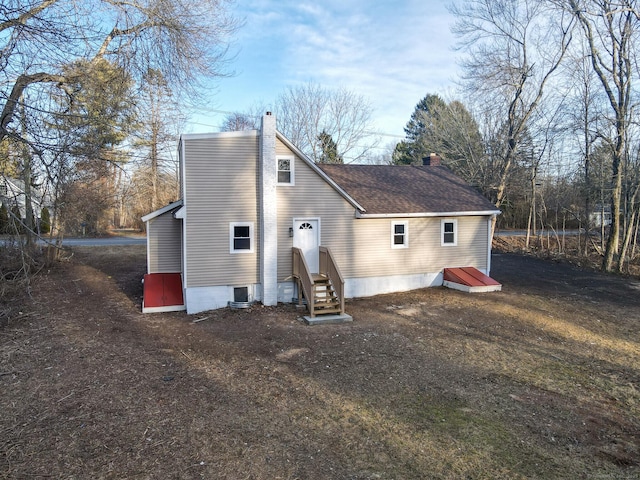 back of property with central AC unit