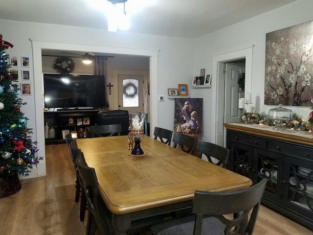 dining area featuring hardwood / wood-style flooring