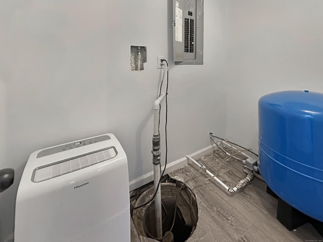 laundry room with electric panel