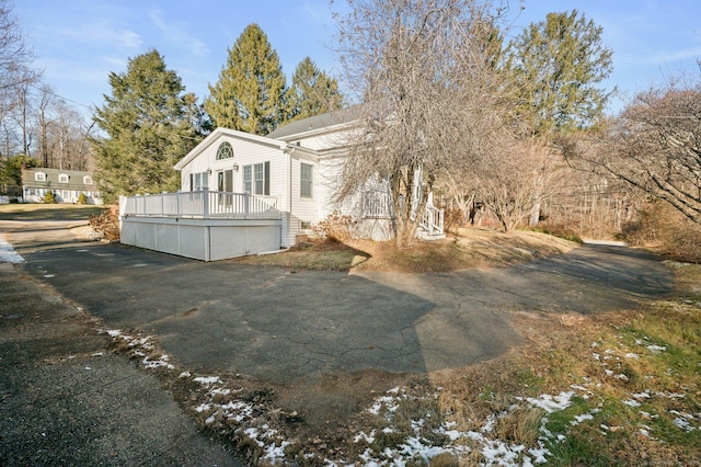 exterior space featuring a deck