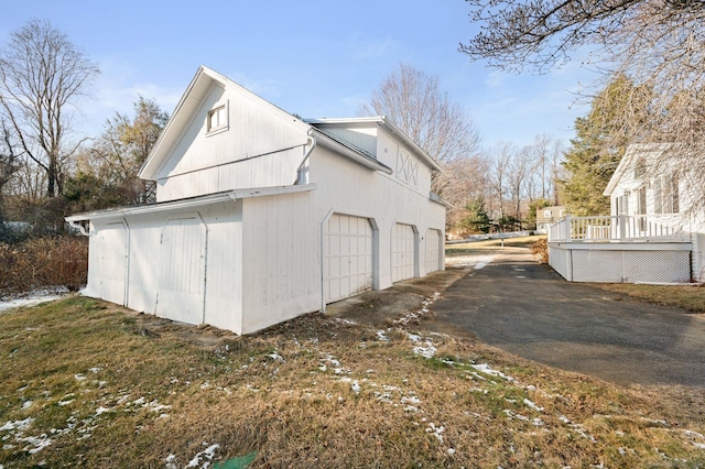 view of property exterior with a deck