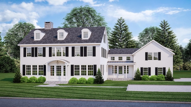 36 Maple Ave S, Westport, CT 06880 - view of front of home featuring a chimney, a front yard, and roof with shingles