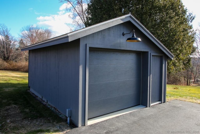 garage with a lawn