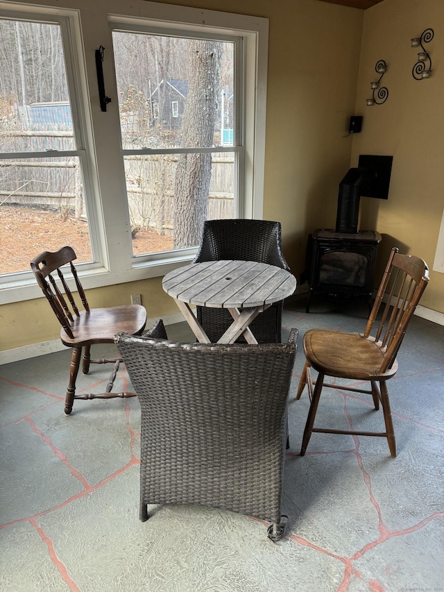 sitting room with a wood stove