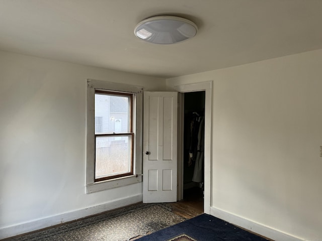 unfurnished room featuring a wealth of natural light