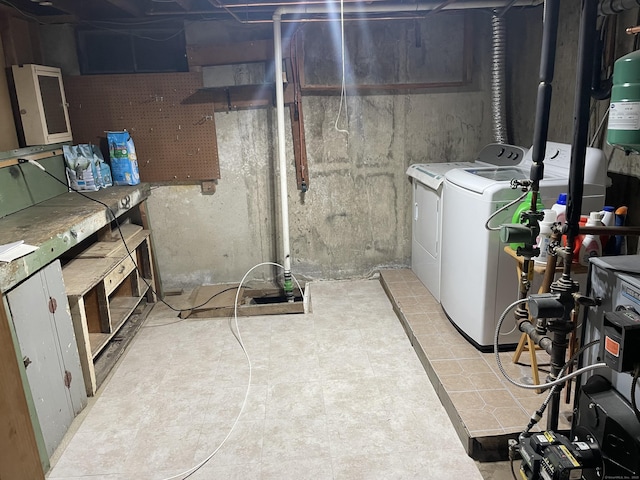 basement featuring separate washer and dryer