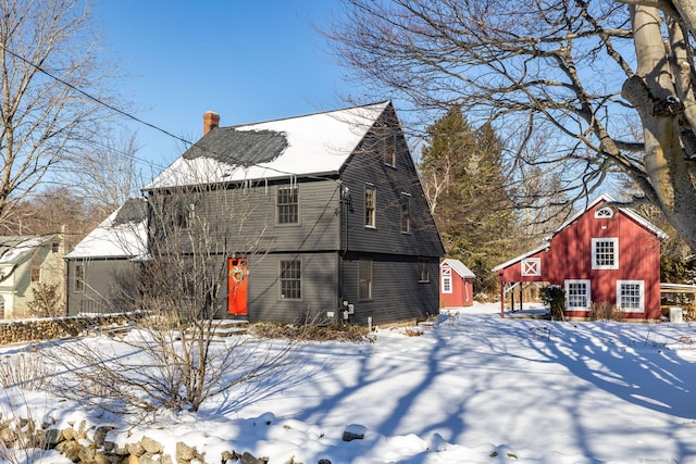 view of snow covered property