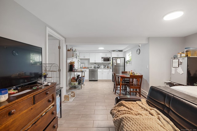 living room featuring baseboard heating