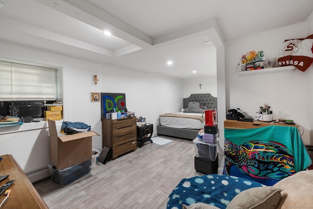 bedroom featuring beamed ceiling, light wood-type flooring, cooling unit, and a baseboard heating unit