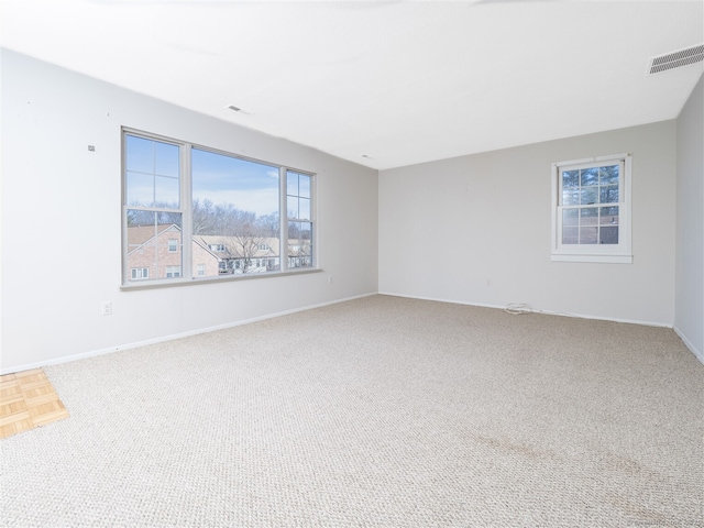 unfurnished room with parquet floors