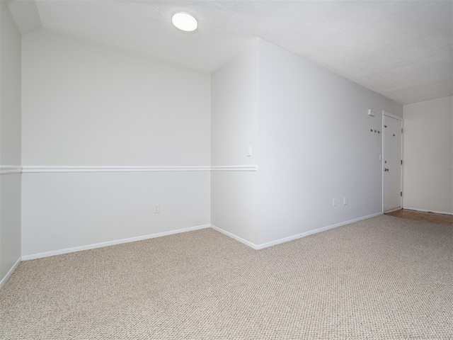 unfurnished room with carpet flooring