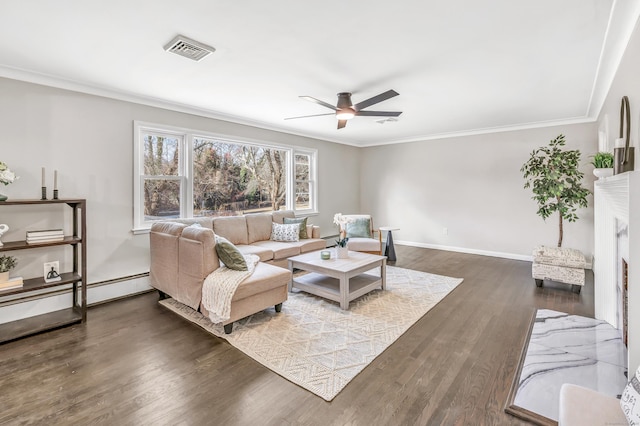 living room with crown molding, ceiling fan, and dark hardwood / wood-style floors