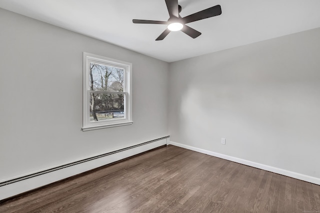 spare room featuring hardwood / wood-style floors, ceiling fan, and a baseboard radiator