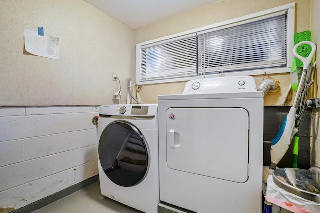 laundry area featuring separate washer and dryer