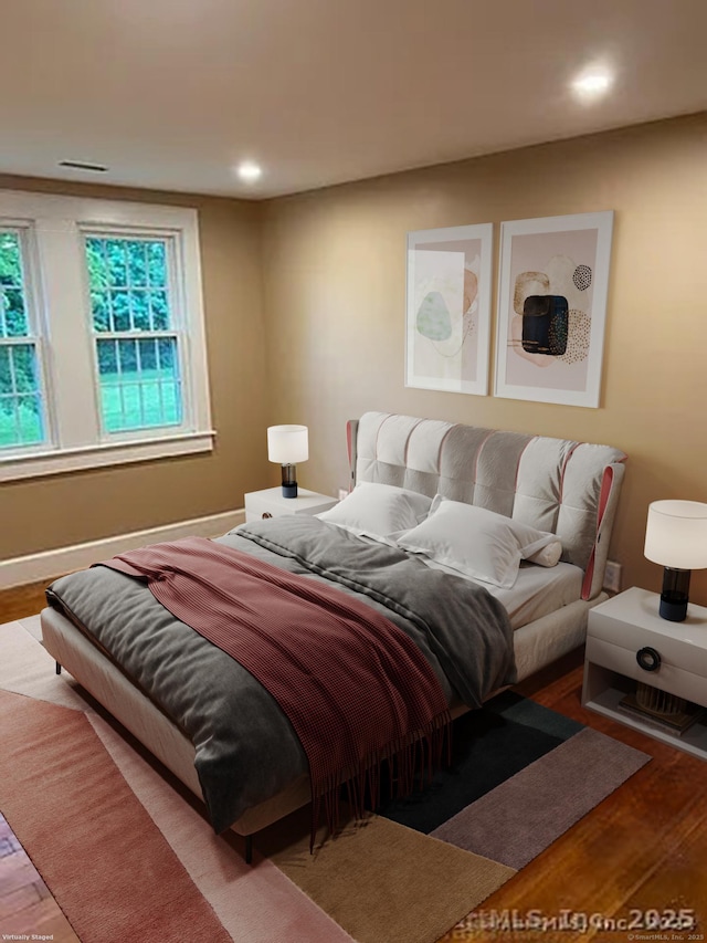 bedroom featuring hardwood / wood-style floors