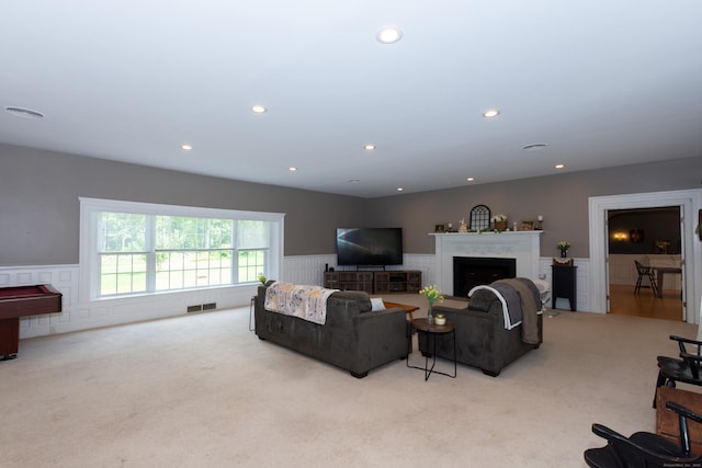 carpeted living room featuring pool table