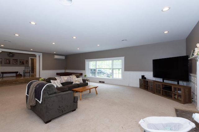 living room with light carpet and a wall unit AC