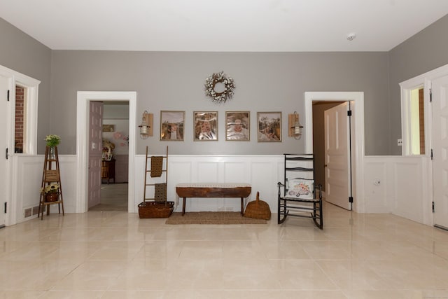 sitting room with light tile patterned floors