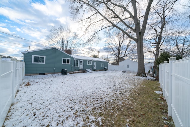 view of snow covered house