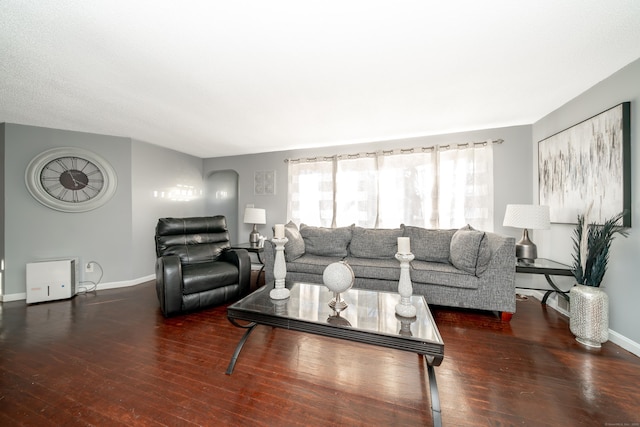 living room featuring dark hardwood / wood-style floors