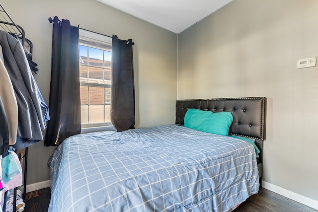 bedroom featuring dark hardwood / wood-style floors